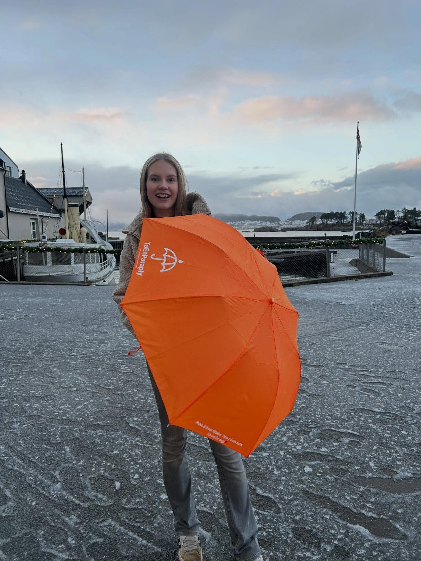 Regnvær i Ålesund med TaEnParaply